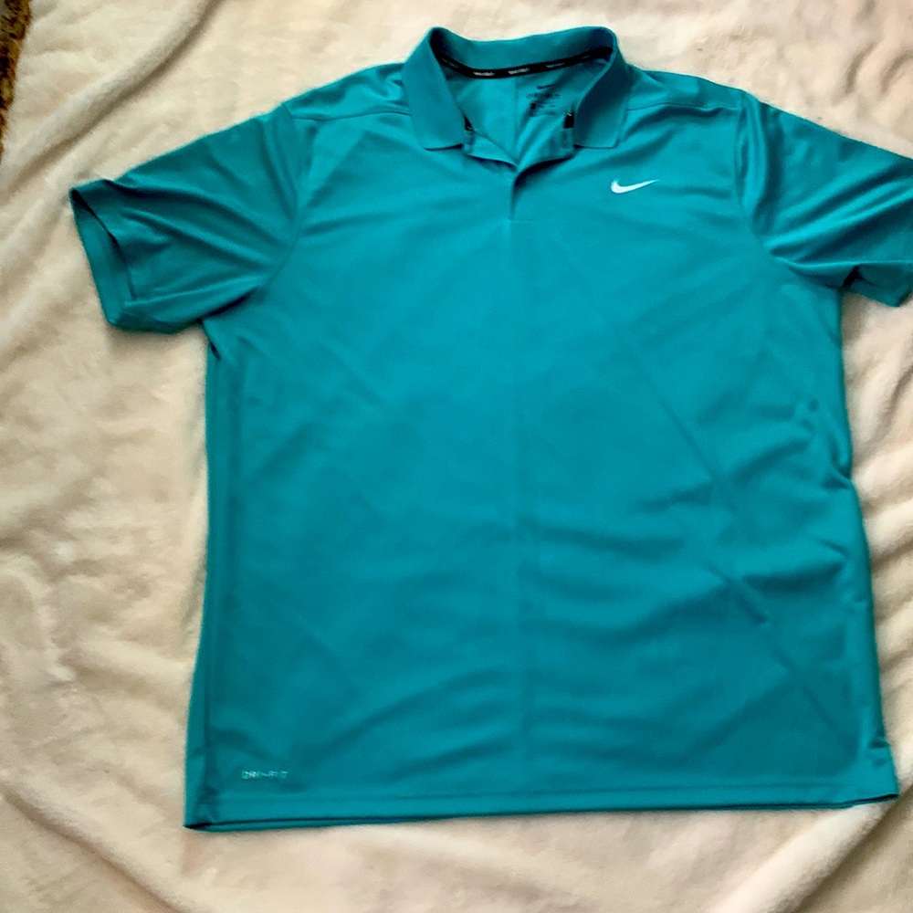 I have a Nike dry fit golf shirt size XXL teal blue
